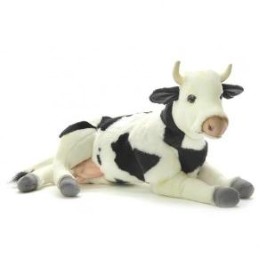 Peluche vache bicolore couchée 35 cm Peluche vache bicolore